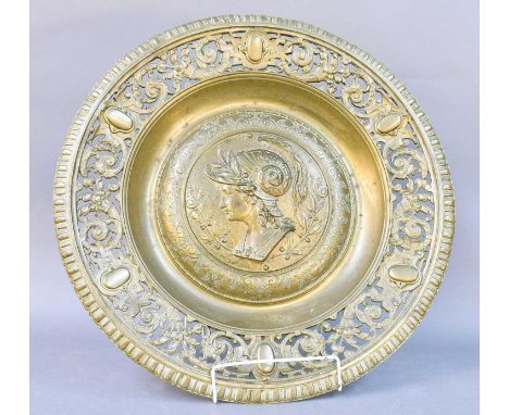 A 19th Century Bronze Charger in the Renaissance Style, the central domed circular panel cast with the portrait head of Mars,