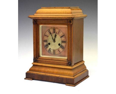 Walnut cased mantel clock with chiming mechanism, 36cm high