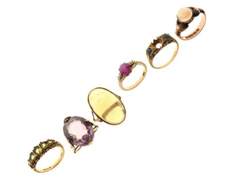 Six gold dress rings, all set with various stones, including a ruby and diamond three stone ring, stamped '9ct', 24g gross ap