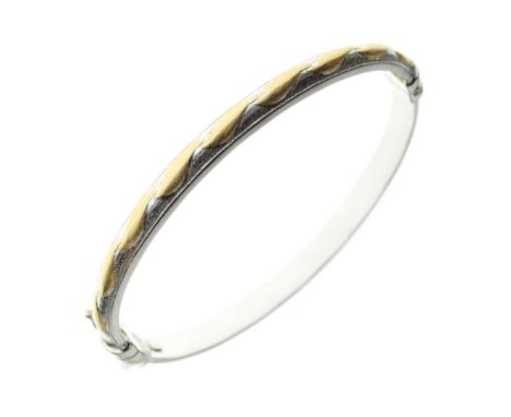 Bi-colour hinged bangle, stamped '14K Italy', 9.5g approxCondition report: **General condition consistent with age and use
