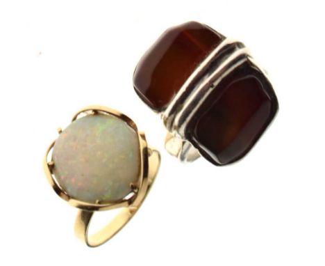 '9ct' ring set large oval opal, size N, plus a modern silver (950) ring set Carnelian, size NCondition report: The opal 15mm 