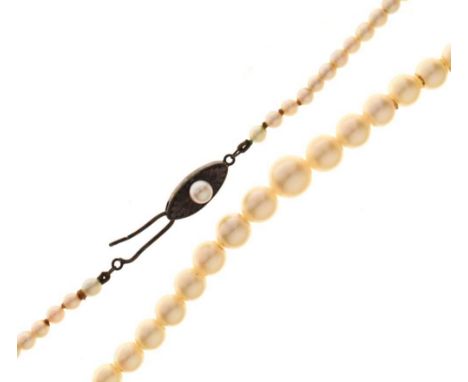 Graduated row of cultured pearls, the silver clasp set a single pearl, 14g gross approx, in fitted caseCondition report: **Ge