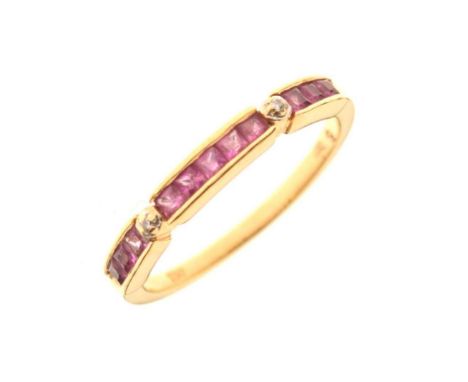 Ruby and diamond half-hoop ring, stamped '750', size N, 2.4g gross approxCondition report: Shank stamped 750. Eleven square c