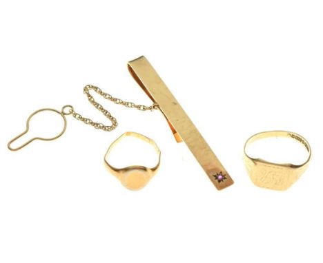 9ct gold signet ring, another gold signet ring and a 9ct gold tie clip set ruby,13.2g gross approxCondition report: Both sign