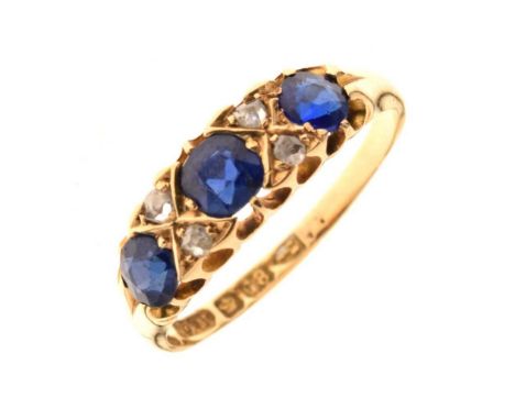 Blue garnet topped doublet and diamond 18ct gold ring, Chester hallmark, date letter obscured, size N, 2.9g gross approxCondi