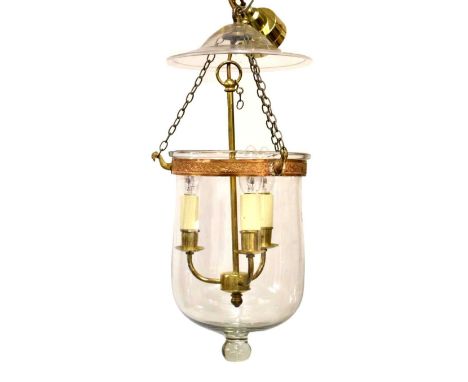 Blown glass hall lantern, having three-branch brass light fitting, dome approx 35cm long