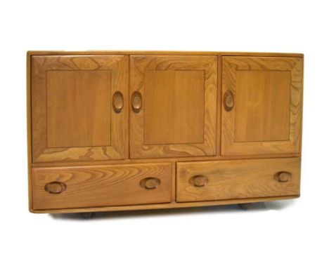 Ercol Windsor three-door and two drawer sideboard, 129cm x 44cm x 78.5cm high