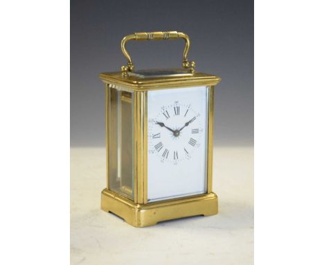 Brass cased carriage clock, having white Arabic dial. 11cm high
