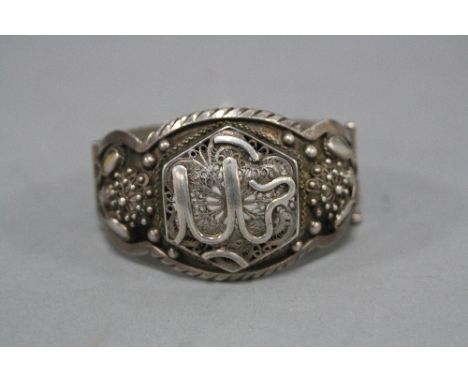 A PERSIAN SILVER AND MOTHER OF PEARL BANGLE