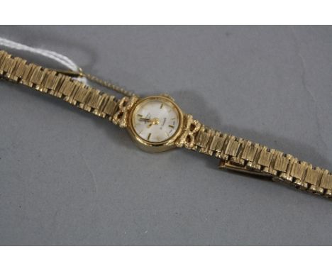 A 9CT ROTARY LADIES WRISTWATCH, on a 9ct bracelet