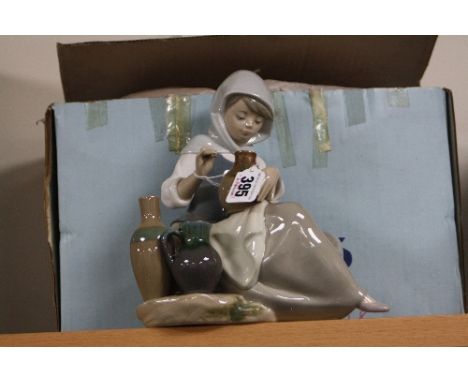 A BOXED LLADRO FIGURE, girl painting pots, 'Pintora Alfarera'