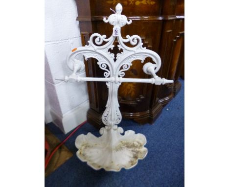 A WHITE PAINTED CAST IRON STICK STAND, stamped WB & Co, to the underside