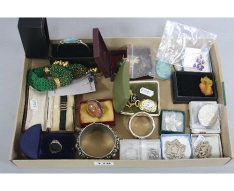 A MIXED LOT, to include silver fobs, coins, rings, bangle, thimbles and silver napkin ring