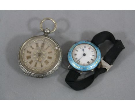 A SILVER FOB WATCH, a silver and enamel fob watch