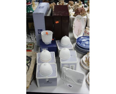 A LLADRO COLLECTORS SOCIETY NAMESTAND, four boxed Lladro seasonal bells, a boxed Llado 'sailing the Seas' candle holder and v