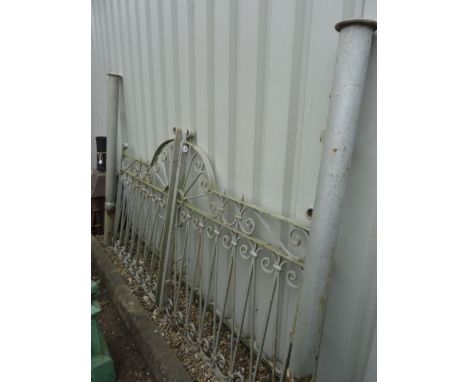 A PAIR OF PAINTED IRON GATES, with hanging posts, each gate approximate maximum size width 102cm x height 124cm