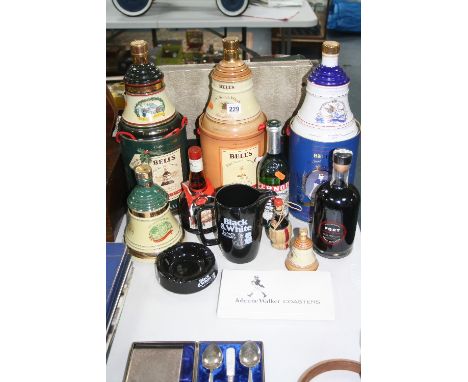 THREE BOXED BELLS SCOTCH WHISKY DECANTERS, together with another unboxed, a bottle of port and other similar items (12)