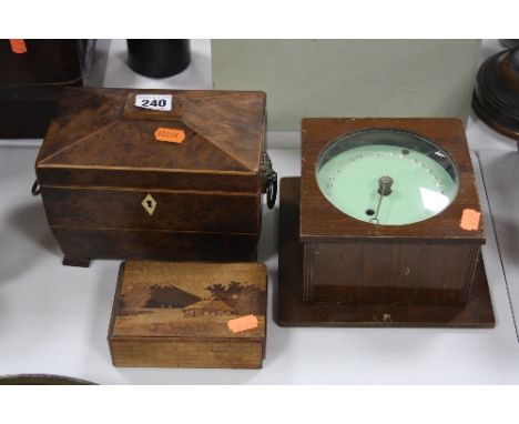 AN EARLY 19TH CENTURY AND LATER BURR YEW WOOD TEA CADDY OF SARCOPHAGUS FORM, together with a clock with fusee mechanism, the 