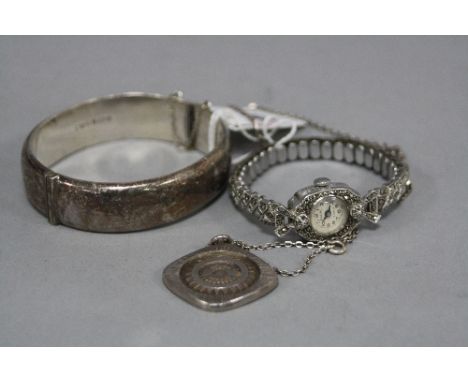 A SILVER COLLECTION, to include a mid 20th Century marcasite ladies wrist watch, an Excal 15 jewelled mechanical hand wound m