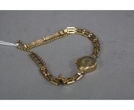 A LATE 20TH CENTURY 9CT GOLD LADIES ROTARY WRISTWATCH, mechanical hand wound 21 jewel movement, cream dial with mixed Arabic 