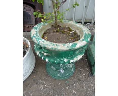 A PRE-CAST GARDEN URN, on seperate base with shrub and a circular planter (2)