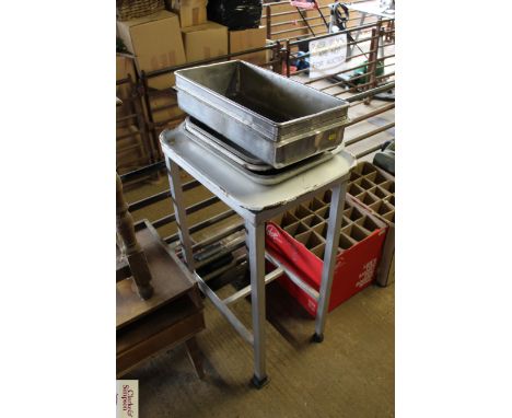 An aluminium weigh stand; a large enamel tray and two smaller; together with two aluminium roasting trays and a stainless ste