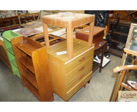 A tile topped side table together with a chest fitted four drawers
