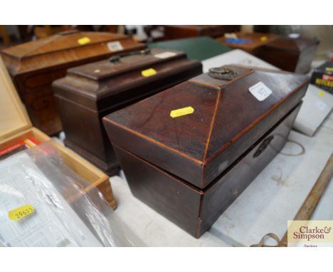 Two 19th Century sarcophagus shaped tea caddies and a Georgian caddy containing three metal containers