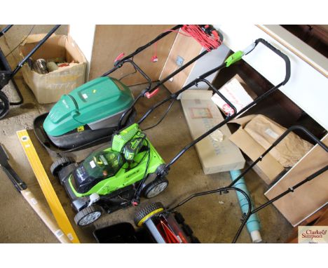 A Greenworks Tools GMax battery operated lawn mower with additional GMax 40V 2.0ah battery and charger