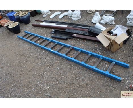 A large single wooden step ladder 
