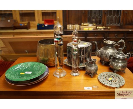 Two silver plated teapots together with a cream jug AF; a trivet stand; various plates; glass thermometers etc