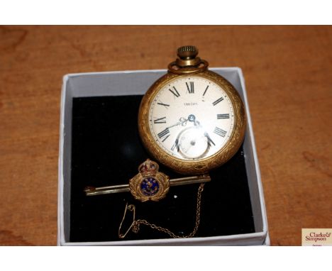 An enamel decorated naval brooch and a Smiths pocket watch