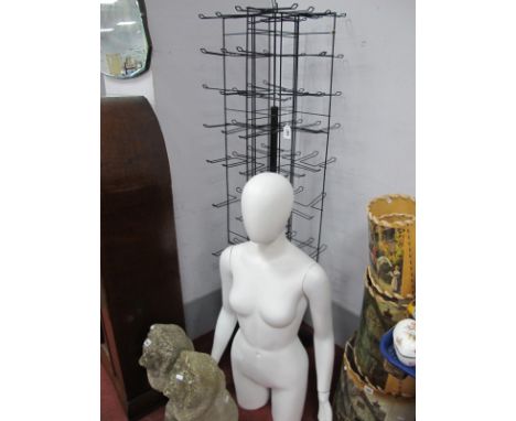 A Female Mannequin, plus shops display revolving rack.
