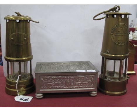 Brass Eccles Safety Lamp, together with a Hockley Lamp &amp; Lime Light Co brass safety lamp, together with a XX Century tin 