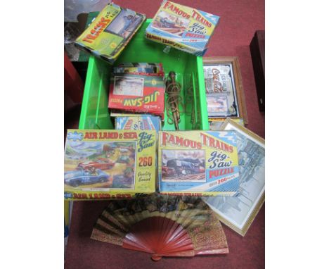 A Coca Cola Mirror, Lowry print, jig saw, Air Land Sea, famous trains:- One Box.