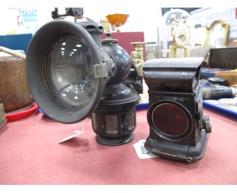 An Early XX Century Carbide Car Lamp, together with one other car lamp. (2)