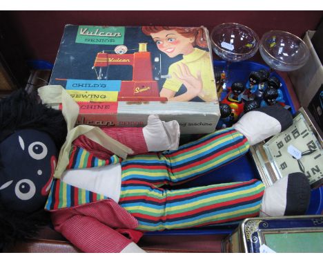 A Vulcan Senior Child's Sewing Machine, soft toys, golly, Robertson's musicians and pilot, Babycham glasses, clock:- One Tray