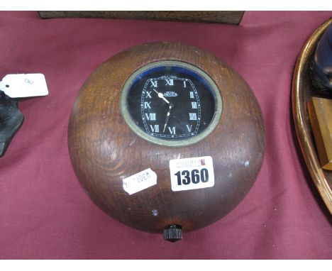 British Jaeger Wind Up Classical Car Clock, in circular oak frame as a wall clock 18.5cm wide.