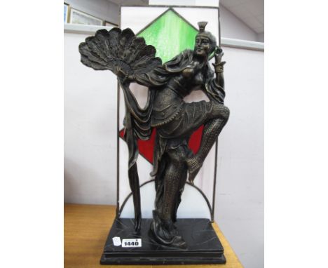 A Modern Reproduction Art Deco Style Lamp, featuring a bronzed effect dancing lady with fan in front of a coloured leaded gla