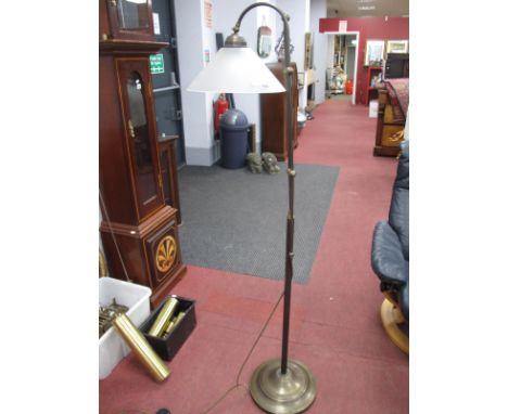 A Standard Lamp, with a frosted glass shade, on circular base.