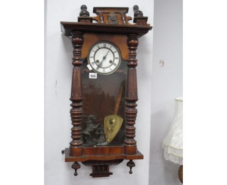 A XIX Century Walnut Viennese Wall Clock, having turned split pilasters, eight day movement.