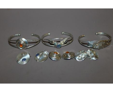 THREE DESIGNER STYLE SILVER BANGLE & EARRING SETS