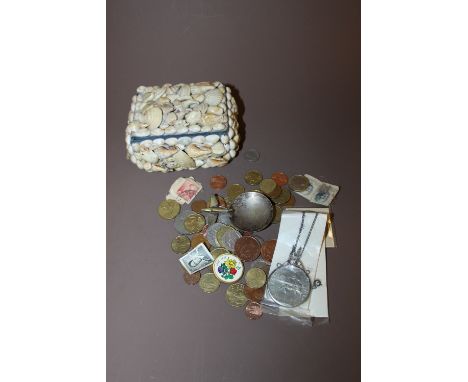 A TRINKET BOX MADE WITH SHELLS CONTAINING COINS, STAMPS ETC