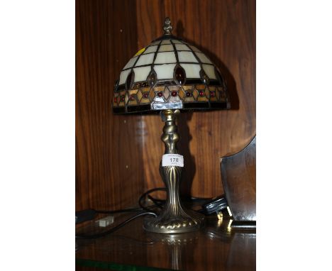 A SMALL TIFFANY STYLE LAMP