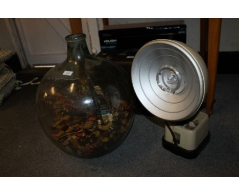 A LARGE GLASS TERRARIUM TOGETHER WITH A LARGE 'HANOVIA' LIGHT
