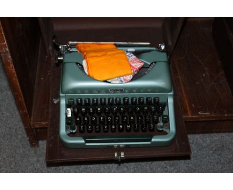 A CASED IMPERIAL TYPEWRITER & ACCESSORIES