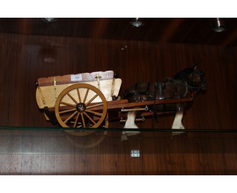A CERAMIC SHIRE HORSE FIGURE