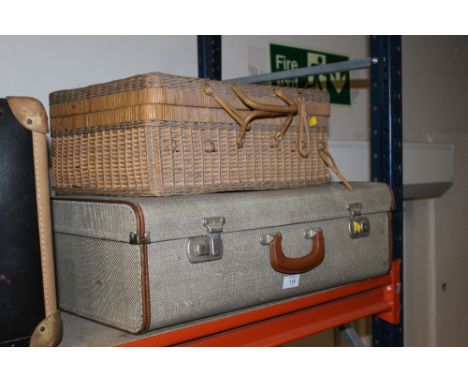 A VINTAGE SUITCASE & A PICNIC HAMPER