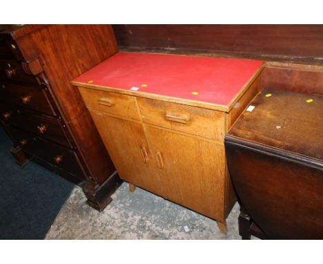 A VINTAGE OAK UNUSUAL ANGLED CABINET TOGETHER WITH A COFFEE TABLE