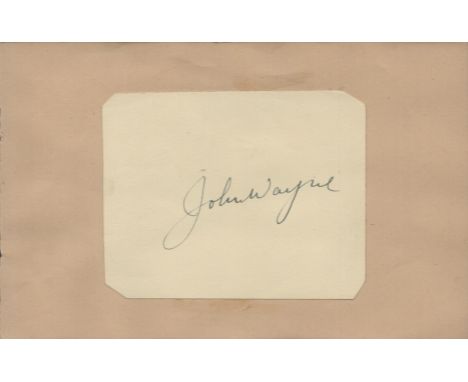 John Wayne signed autograph small white card cut out Approx. 3.5x2.75 Inch fix onto light brown page. Was an American actor w